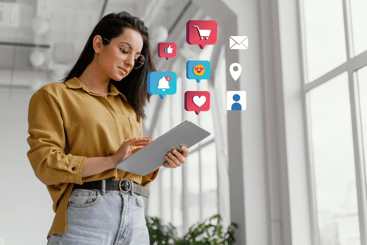 A woman engaged with a tablet displaying social media icons, illustrating content marketing trends.