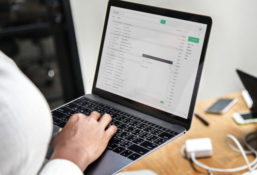 a woman typing on a laptop, Personalizing E-mails